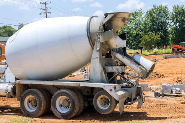 Delivery concrete mixer truck the fresh concrete for preparing to pour concrete in foundation