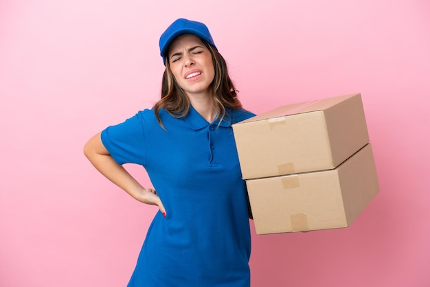 Delivery Italian woman isolated on pink background suffering from backache for having made an effort