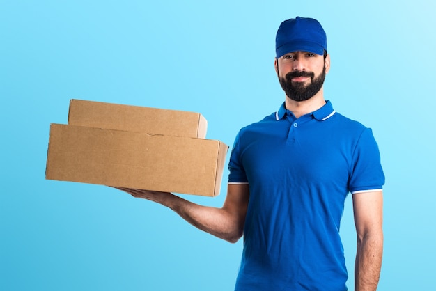 Delivery man  on colorful background