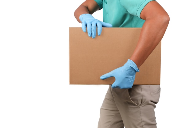 Delivery man holding cardboard box