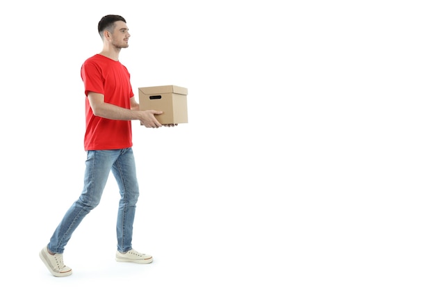 Delivery man walking with a box, isolated on white background