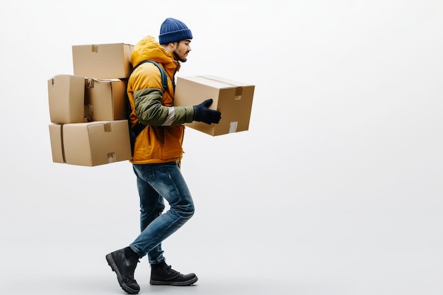 Delivery Worker Carrying Cardboard Boxes