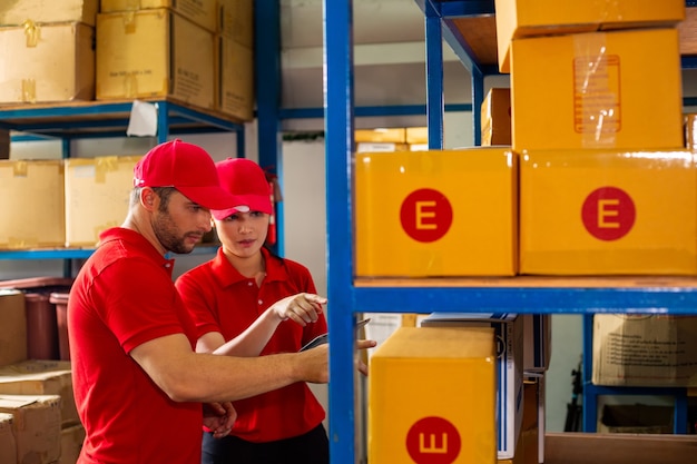 Delivery worker holding carton for ship to Customer