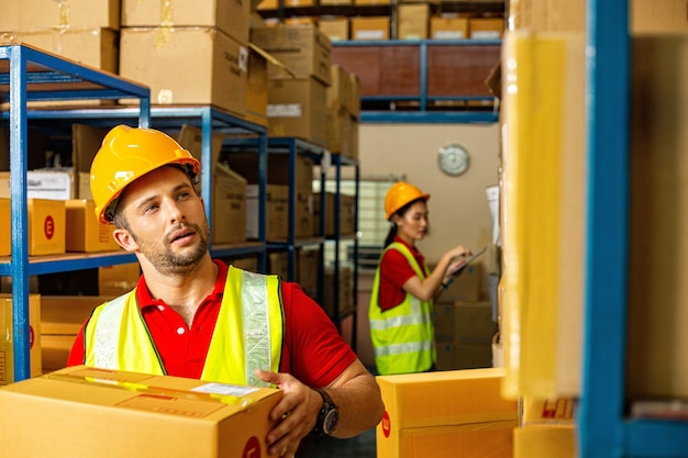 Delivery worker holding carton for ship to Customer