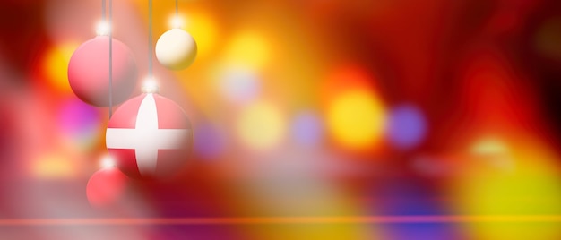 Denmark flag on Christmas ball with blurred and abstract background