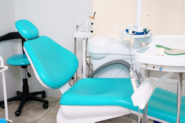 dental chair is located in the dentist's office