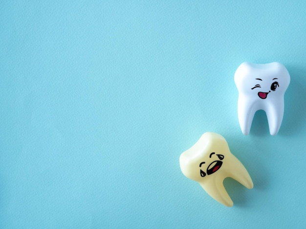 Dental concept tooth and brush on a blue background