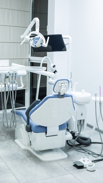 Dental empty modern chair in the dentist's office. 