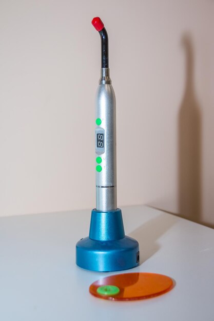 Dental UV curing light lamp Ultraviolet polymerization Light Tool With Orange blocking glass tooth care concept