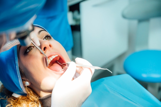 Dentist examining a patient