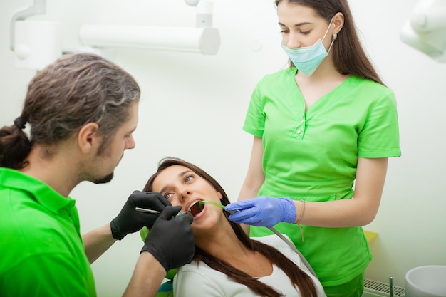 Dentist and patient in dentist office