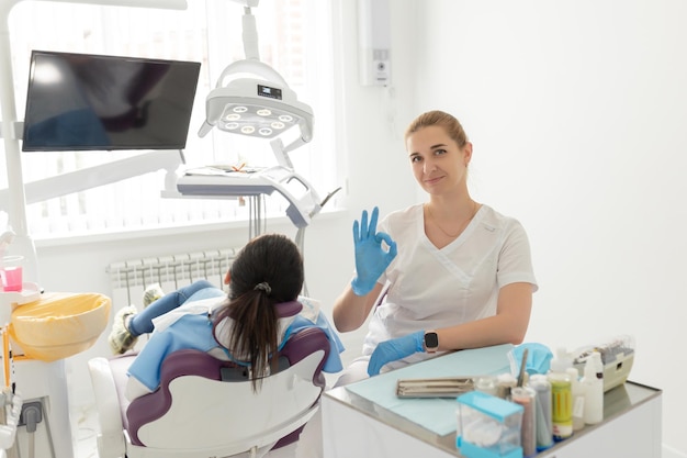 Dentist and patient in dentist office