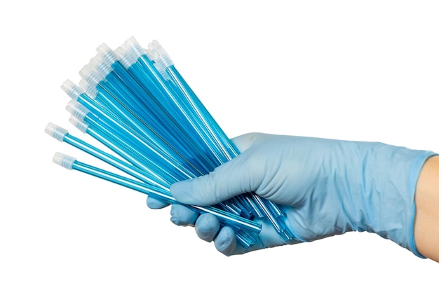 Dentist's hand in glove with saliva ejectors