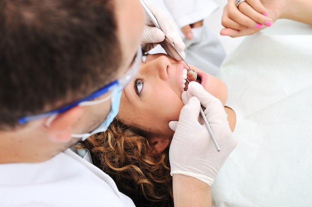 Dentist's teeth checkup, series of related photos