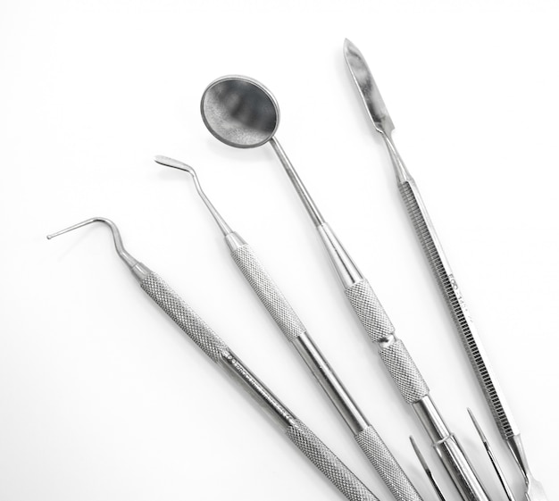 Dentist tools isolated on white