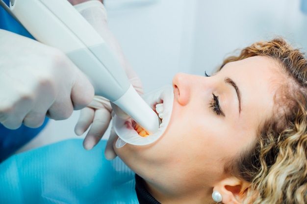 Dentist using innovative 3d ultrasound for dental check