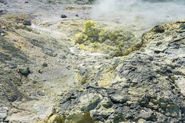 Deposits of native sulfur in a fumarole field on the slopes of the Mendeleev volcano