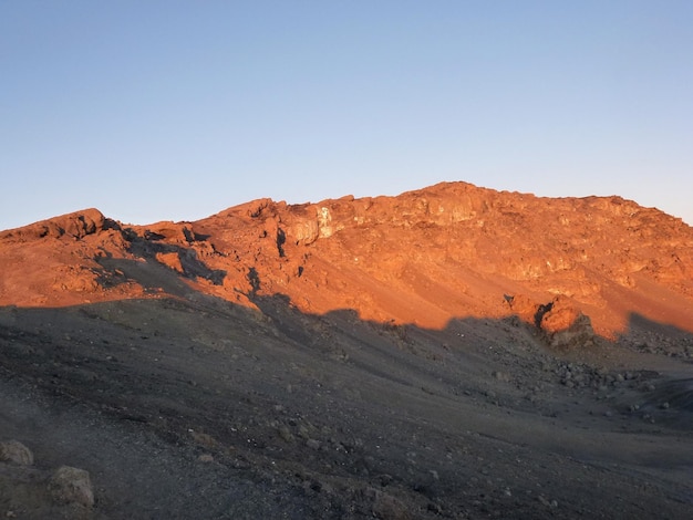 Desert landscape with mountains and brown sand and blue sky Drought and dehydration