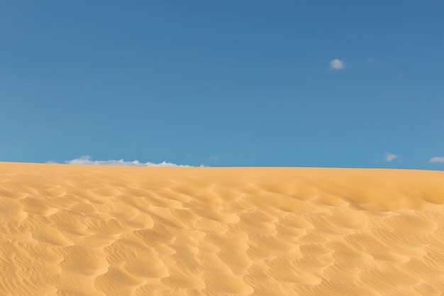 desert sand against blue sky