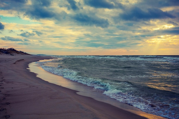 Deserted beach in stormy weather