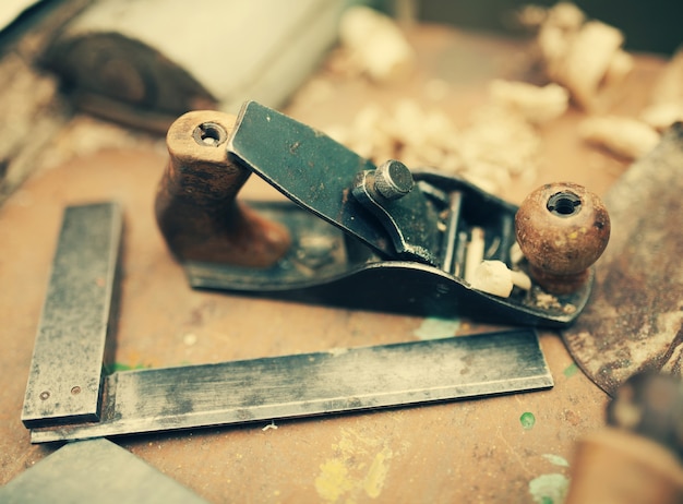 Desk of a carpenter with some tools