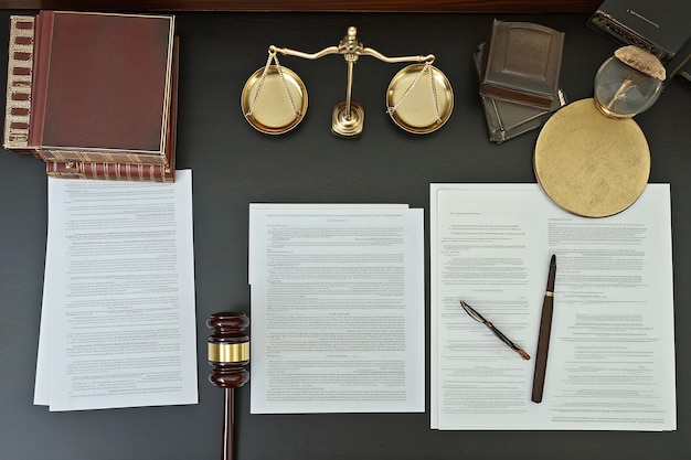 a desk with a piece of paper and a pen on it