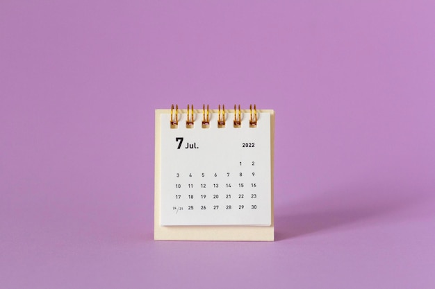 Desktop calendar for July 2022 on a lilac background