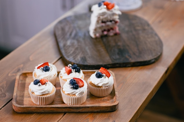 Dessert cake on kitchen table Cakes cupcakes and sweet dessert