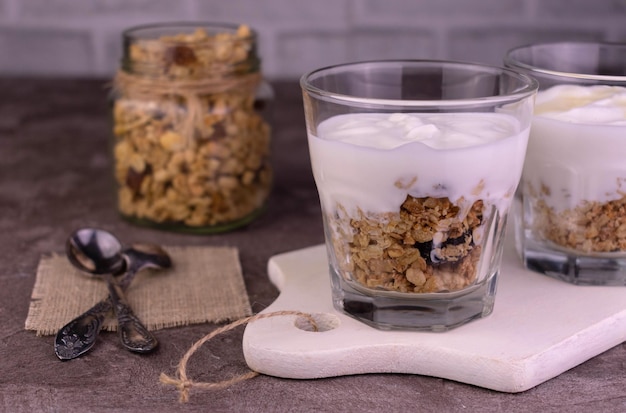 Dessert of Greek yogurt and granola in a glass