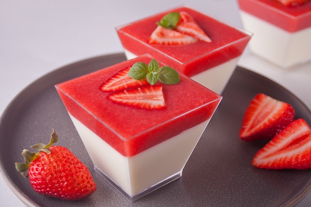 Dessert panna cotta with fresh strawberries 