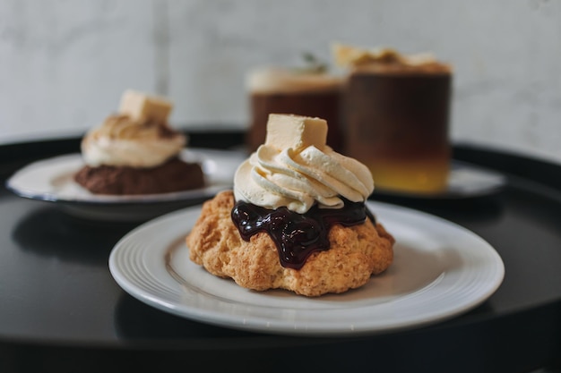 Dessert set of scones and americano coffee for couple