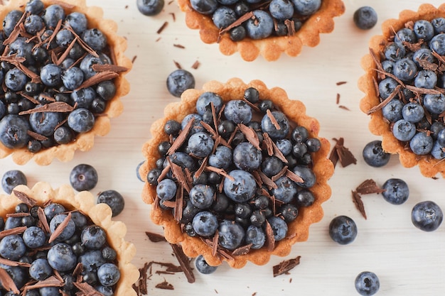 Dessert with blackberries on a light background