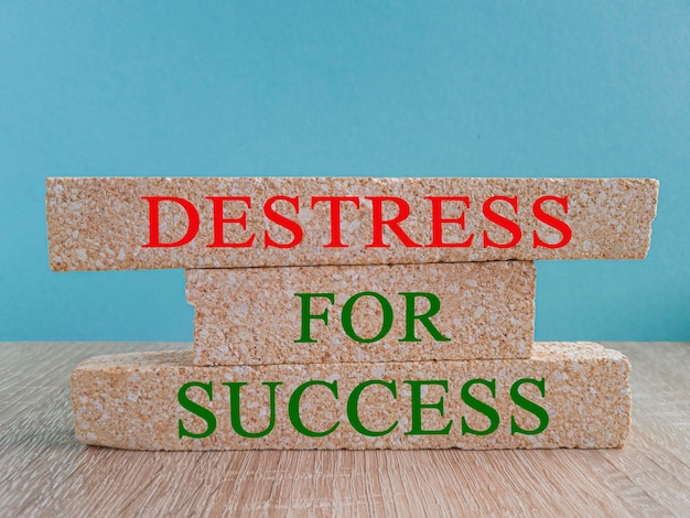 Destress for success symbol Concept words Destress for success on brick blocks