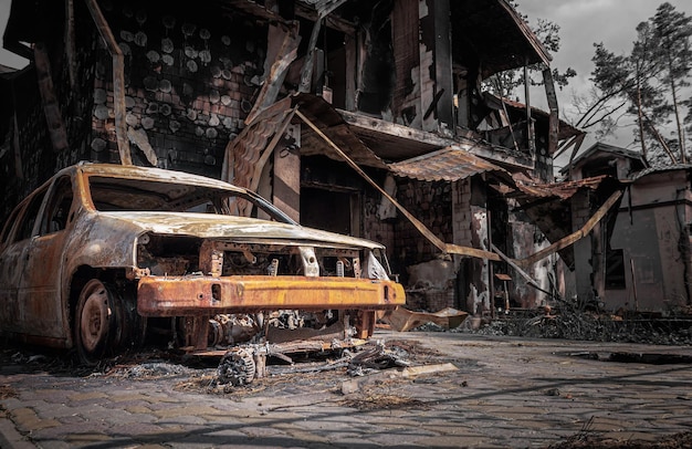 Destroyed house and car Consequences of shelling in Russia's war against Ukraine Irpin Kyiv region