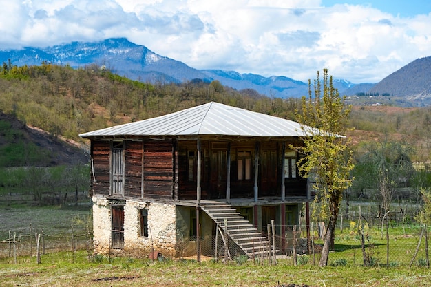 Detached old twostory wooden house Traditional Georgian house in the village