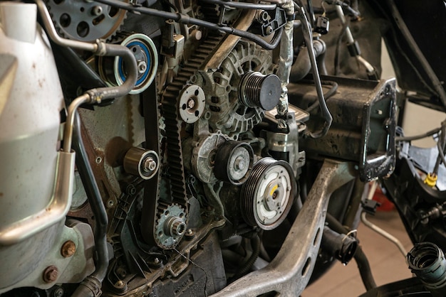 Detail of Car engine timing belt in a workshop