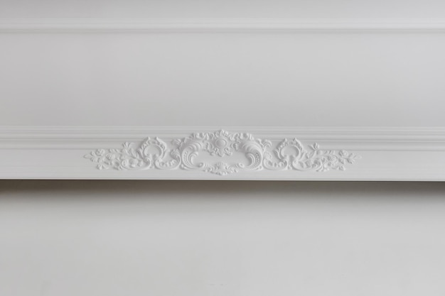 Photo detail of corner ceiling cornice with intricate crown molding