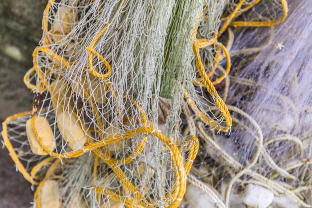 Detail of a fishing net. Abstract closeup, fishing industry concept, ecology nature template