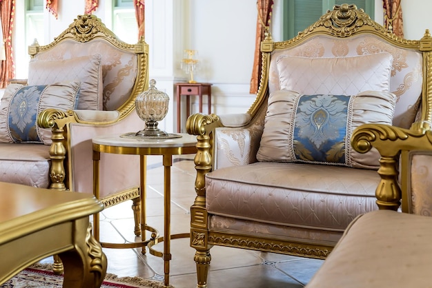 Detail image of pillows on an antique luxury sofa interior design and decoration