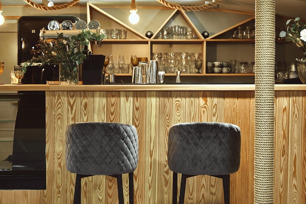 Detail of interior of designed restaurant. Bar table in an expensive restaurant