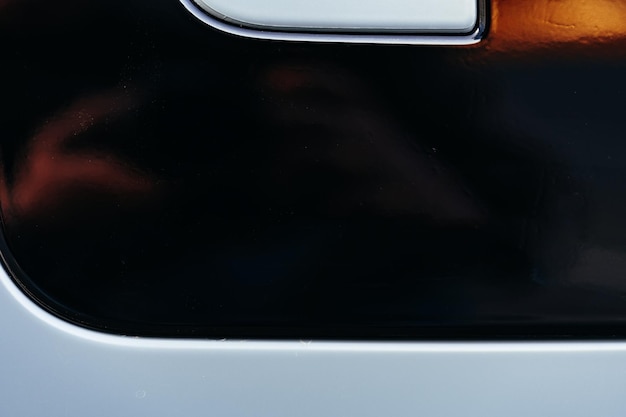 Detail of metal fender of a luxury car