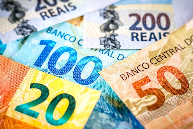 The detail of the notes of two hundred one hundred fifty and twenty reais The real is the currency of Brazil