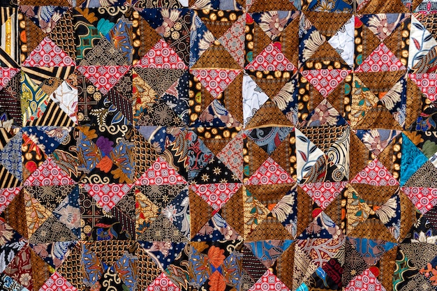 Detail patchwork quilt in market Bali island Ubud Indonesia Closeup patchwork blanket texture