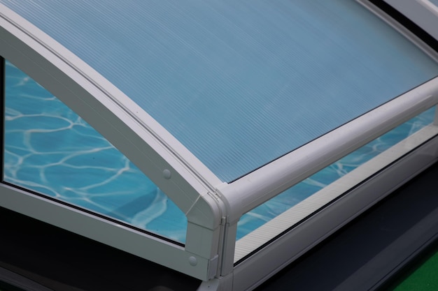 Detail of roof retractable swimming pool enclosures