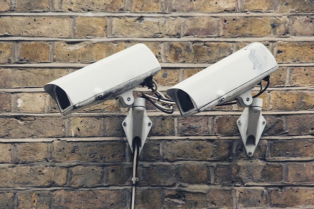 detail shot of CCTV security cameras front of building ,shot in london