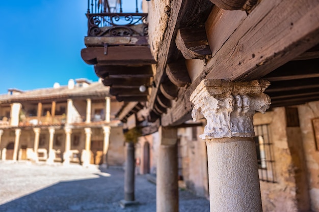 Detail of the stone columns that support the buildings in the ancient medieval city of Pedraza Segovia