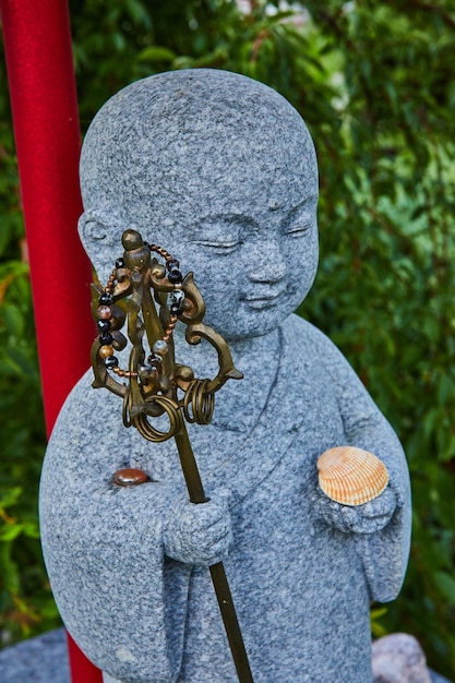 Detail of stone statue figure at Tibetan Mongolian Buddhist shrine