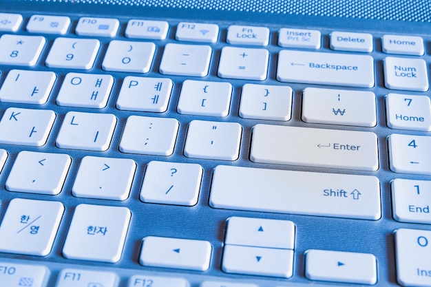 Detail of white keyboard keys of personal computer.