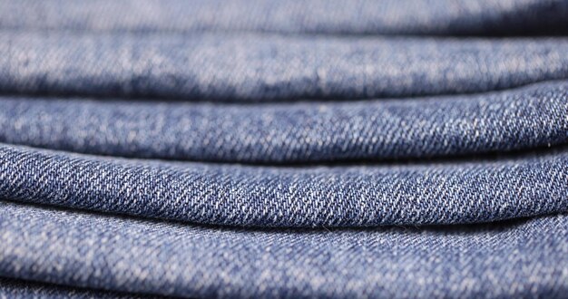 details of clothes made of blue denim soft fabric