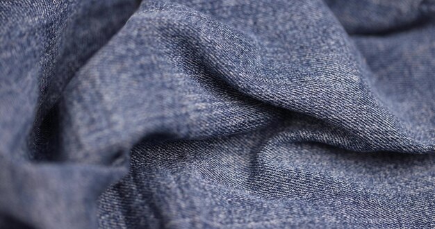 details of clothes made of blue denim soft fabric